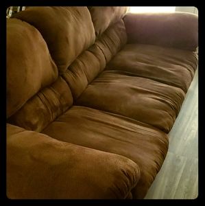 A sofa and matching love seat